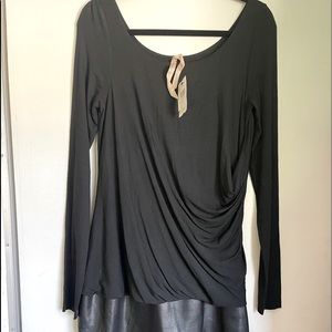 Bailey , long sleeve , fitted foe leather bottom black short dress. Size L